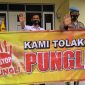 Foto : Polsek Lahei Gunakan Spanduk Sampaikan Pesan Saber Pungli Kepada Warga